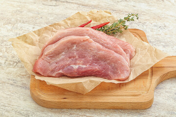 Raw pork schnitzel for roast