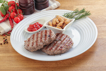 Grilled beef burger cutlet with sauce