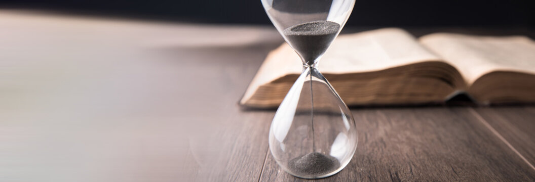 Hourglass countdown with a book