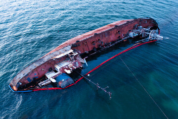 Sea Storm Fallout: Capsized Tanker Amidst Raging Waves