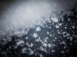 Snow background with vignette, closeup, selective focus