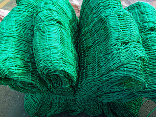 New strong green fishing net.  Abstract green fishing net background perfect for designs creation...
