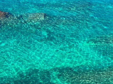 Sea water blue azure clear ocean aerial view.
