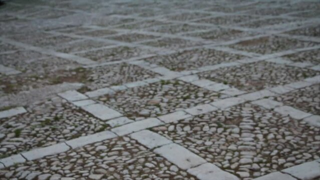 noto sicily italy palazzo nicolaci di villadorata stone square ground floor courtyard exterior outside evening morning with car vehicle parked tilt up