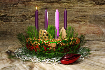 Advent wreath with one candle burning. First Sunday concept. 