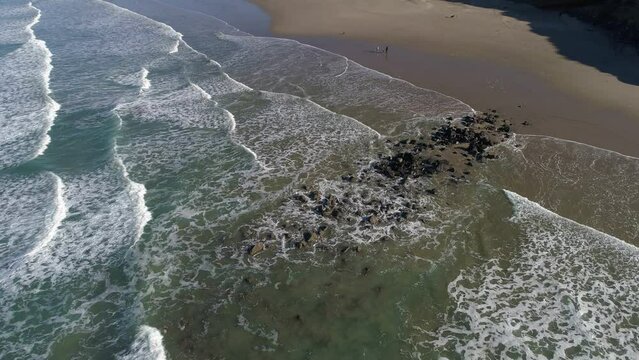 Aerial oblique pull back reveal of Nye Beach, Newport Oregon Video 7