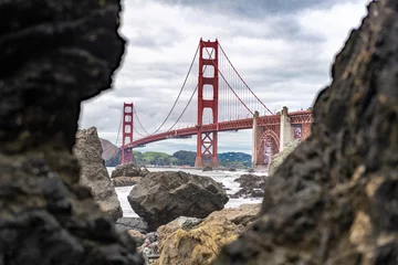 Foto auf Acrylglas Baker Strand, San Francisco Golden Gate Bridge in San Francisco, California. The Golden Gate Bridge is a suspension bridge spanning the Golden Gate. Baker Beach in Background. USA