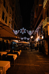 Fototapeta na wymiar Christmas decorations at night in Alicante city