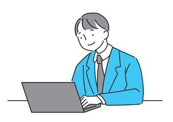 ラップトップで仕事するスーツの男性