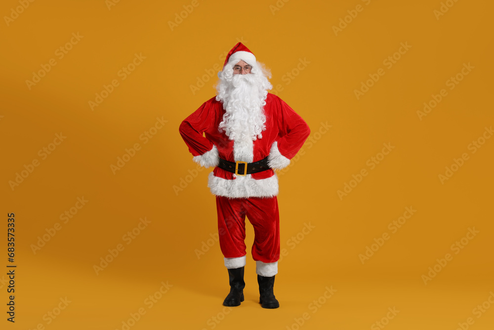 Sticker Merry Christmas. Santa Claus posing on orange background