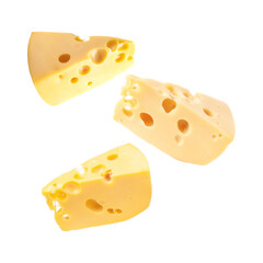 Pieces of tasty cheese falling on white background