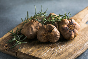 Obraz na płótnie Canvas Black garlic, health food made by fermenting garlic