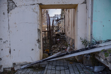 Izyum, Ukraine - November 11, 2023: Massive russian strikes damaged residential buildings, shops, banks and pharmacies.