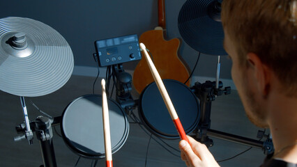 Unrecognizable musician hands hitting drum plates in recording studio. Media. Drummer hands...