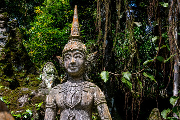 Fototapeta na wymiar Statue at the Secret Buddha Garden on Koh Samui island in Thailand