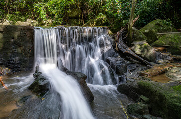 Stream and waterfall in a tropical jungle on Koh Samui island in Thailand