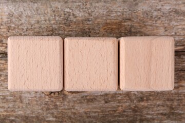 International Organization for Standardization. Cubes with abbreviation ISO on wooden table, top...