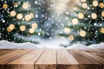 Empty wood table and defocused bokeh and blur christmas tree background with snow