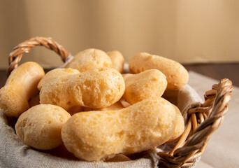 Close Up Brazilian starch biscuit in a basket( biscoito polvilho made with tapioca or cassava flour ). Typical Brazilian biscuit