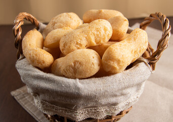 Close Up Brazilian starch biscuit in a basket( biscoito polvilho made with tapioca or cassava flour ). Typical Brazilian biscuit