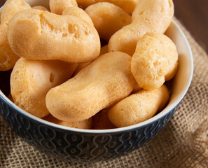 Close Up of Traditional Brazilian starch biscuit (called polvilho biscuit made with tapioca or cassava flour ). In a bowl