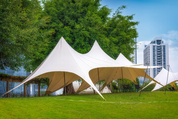 Tent park grass and modern architecture
