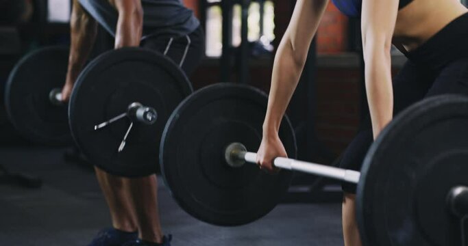 Couple, barbell and fitness in gym for muscle training, health and workout together for bodybuilding. Wellness, strong people and endurance, resilience and challenge with power and weightlifting