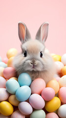 An adorable bunny nestles in a basket amid a sea of soft-hued Easter eggs, set against a delicate pink background for a sweet seasonal touch.