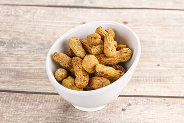 Raw ripe unpeeled peanut heap
