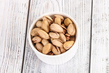 Salted tasty pistachio nuts heap