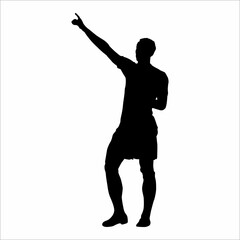 Fototapeta na wymiar Silhouette of a football player pointing