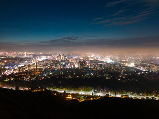 Fototapeta na wymiar Aerial view of Almaty city highways at night
