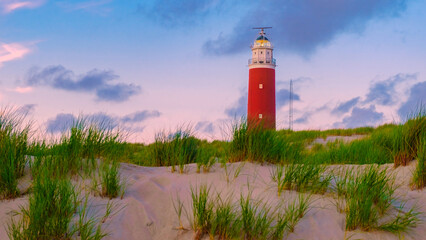 Texell lighthouse during sunset on the beach in the Netherlands Dutch Island Texel in summer with...