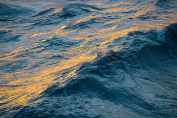 Waves on the flooded Rhône at sunset