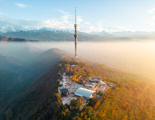 Kok-Tobe hill with Television Tower and amusement park in Almaty city