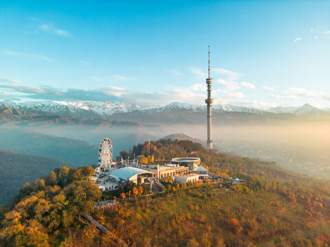 Kok-Tobe hill with Television Tower and amusement park in Almaty city