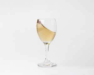 front view of white wine glass isolated on white background