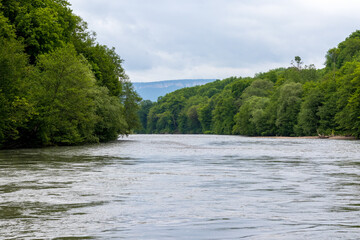 river, mountainous terrain, cloudy day, the beginning of the summer period, walking in the bosom of...