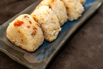 Japanese Rice Balls Onigiri with Salmon Flakes and Mixed Grains