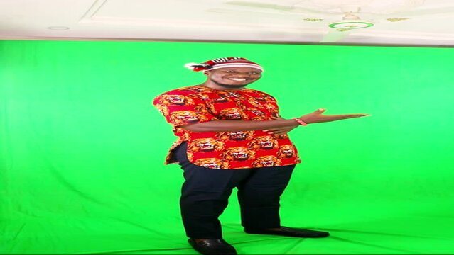 Full frame standing presentation in a studio of green screen