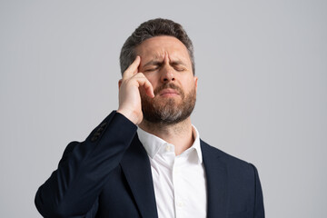 Headache and strain. Headache, tiredness and stress. Businessman in suit with headache. Businessman with stress and burnout. Business man got migraine touch head because of pain. Office Stress