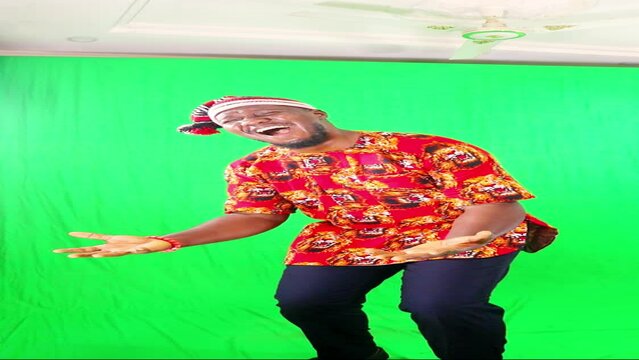Crying and unhappy Igbo business man in the official dressing attire of the Igbos over poor business choices