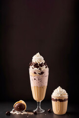 
chocolate ice cream milkshake on dark background