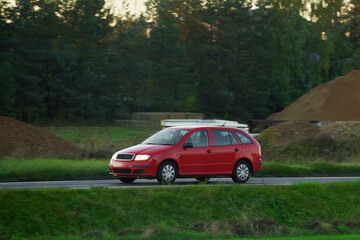 A New and Modern Station Wagon Car on the Highway. A Spacious and Elegant Vehicle for Family and...