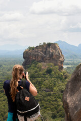 Discover the awe-inspiring beauty of Sigiriya Rock, a UNESCO World Heritage Site in Sri Lanka. This ancient fortress, crowned by frescoes and surrounded by lush gardens, is a captivating blend of hist