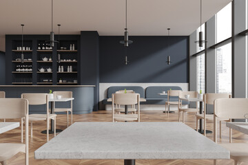 Modern cafe interior with seats and table, bar counter and panoramic window