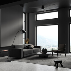 Gray living room corner with sofa and armchair