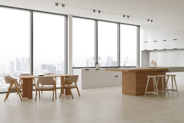 White home kitchen interior with bar counter and cooking corner, window