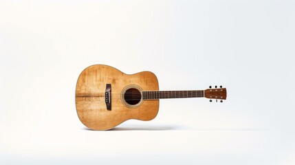 a brown acoustic guitar