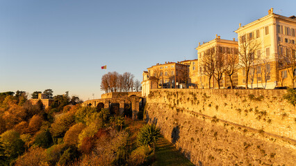 Fototapeta premium Bergamo, Italy. Amazing view of the Venetian walls and old buildings during sunrise. An Unesco world heritage